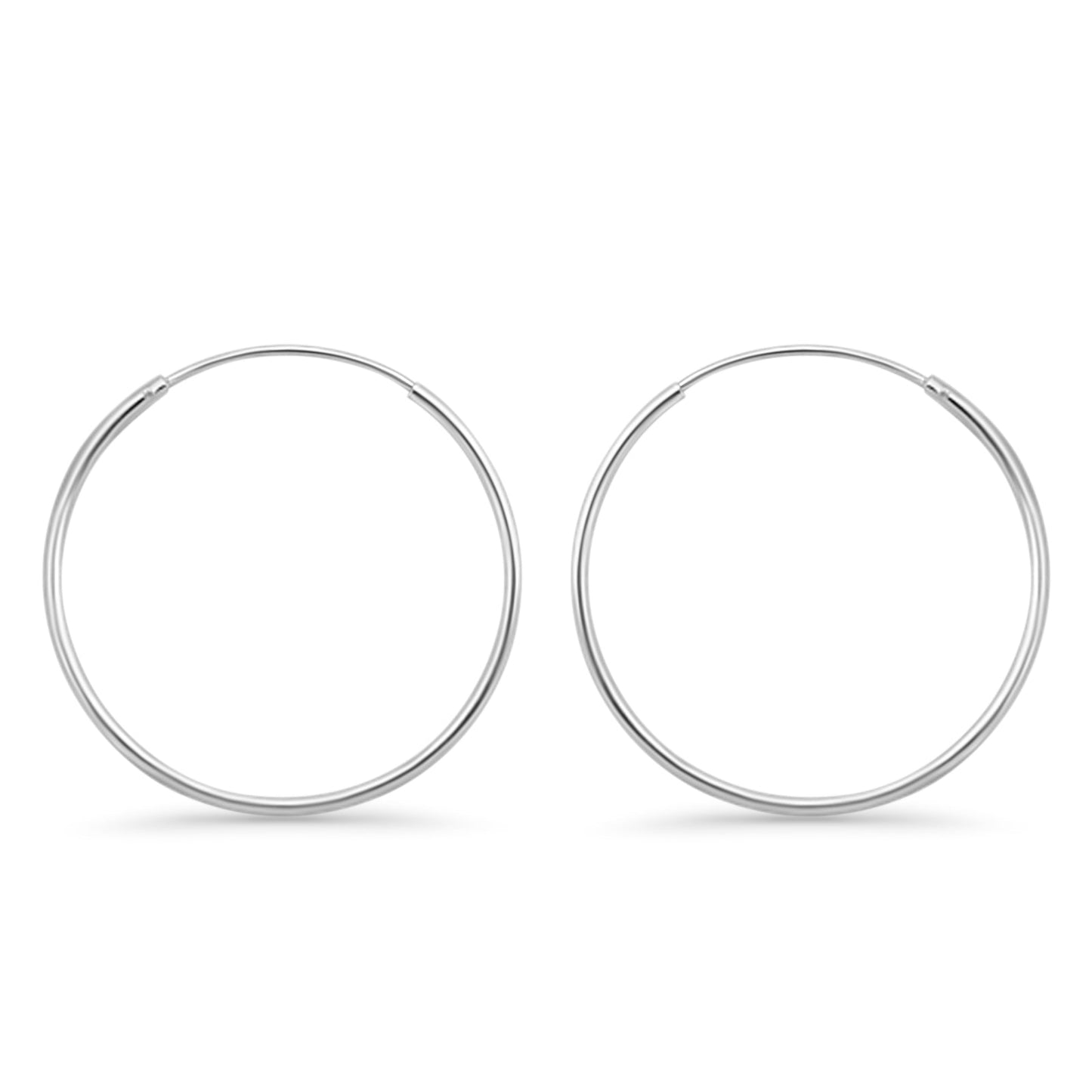 Melchior Jewellery minimalist round sterling silver rhodium plated hoop earrings for women polished finish