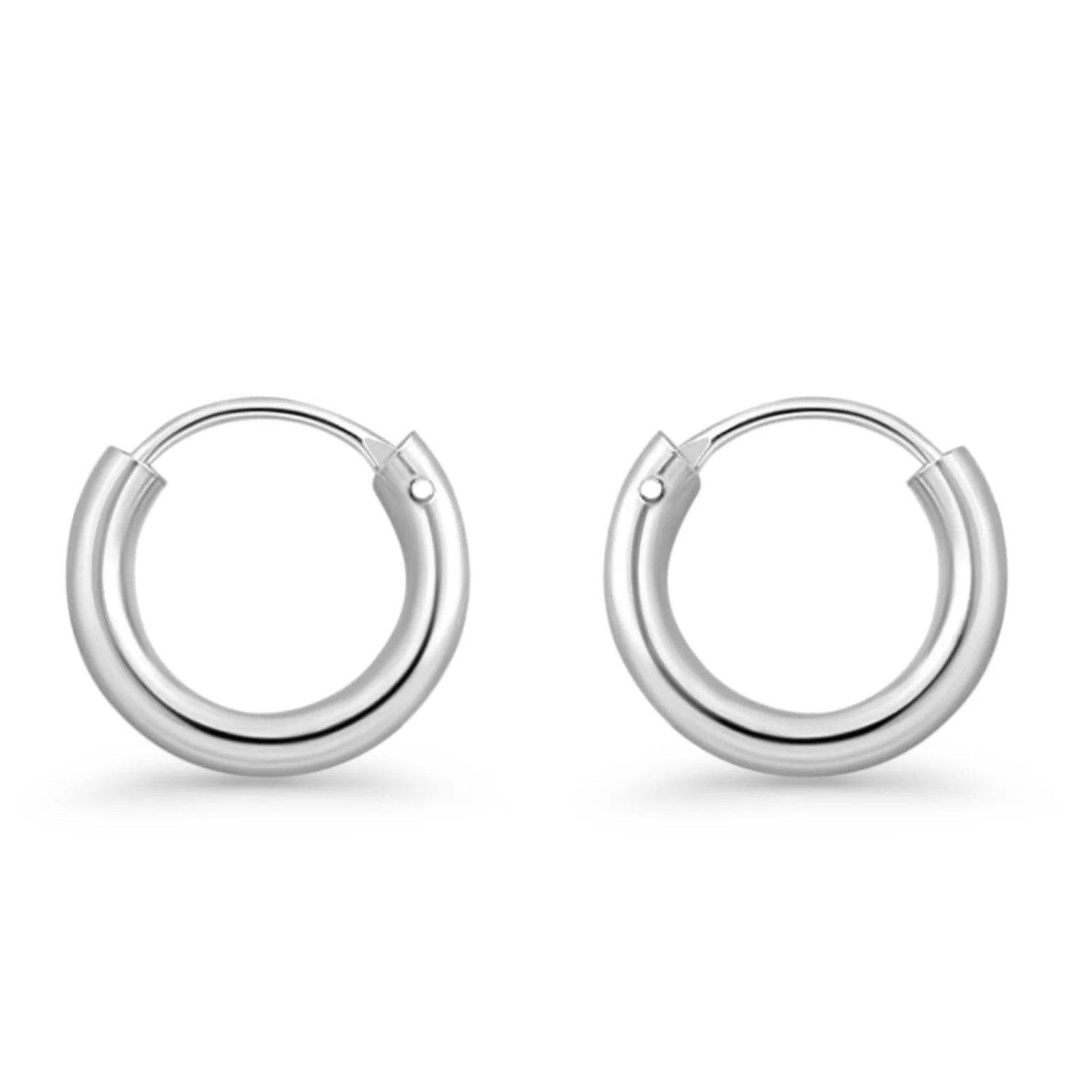 Melchior Jewellery polished small round hoops on white background sterling silver rhodium plated hoop earrings