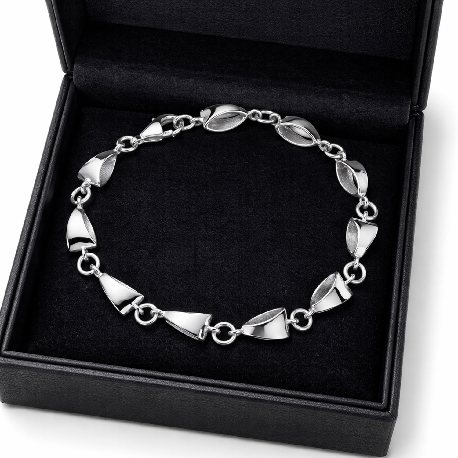 Sterling silver triangle bracelet by Melchior Jewellery displayed in a black jewellery box
