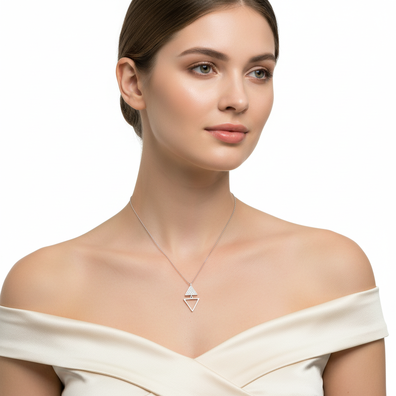 Woman wearing sterling silver triangle pendant necklace from Melchior Jewellery with double triangle design