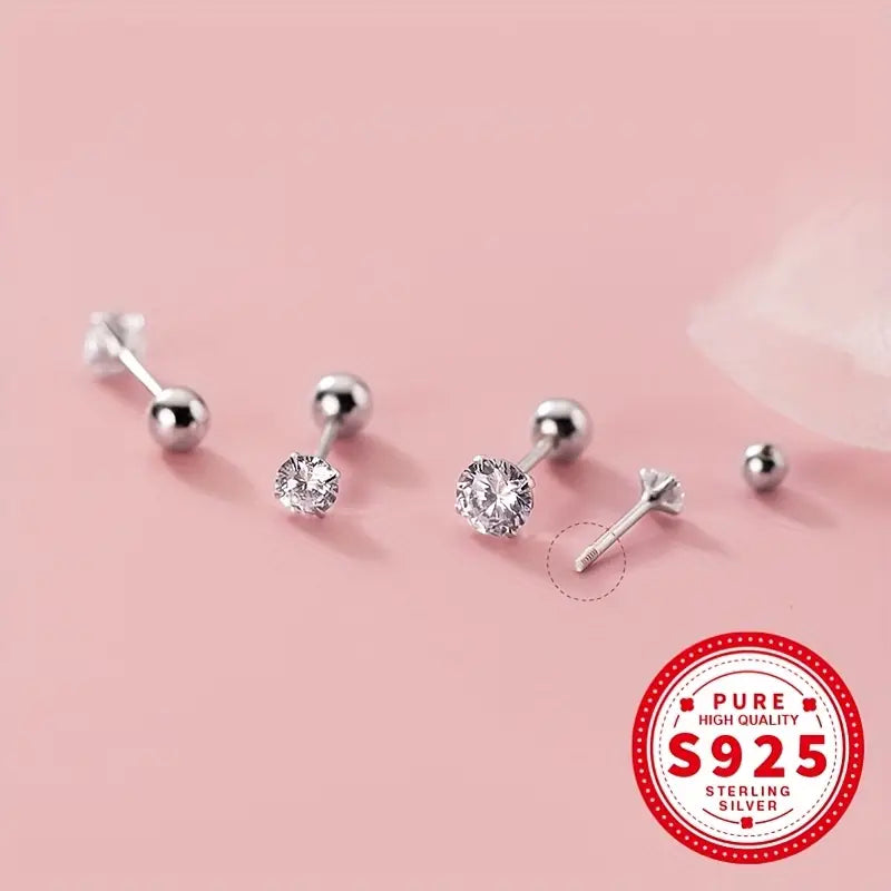 Melchior Jewellery tiny round CZ screw back earrings for kids in sterling silver set on pink background