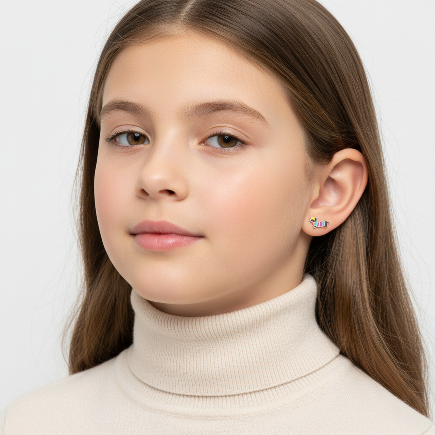 Girl wearing Melchior Jewellery sausage dog stud earrings for girls in colourful enamel design