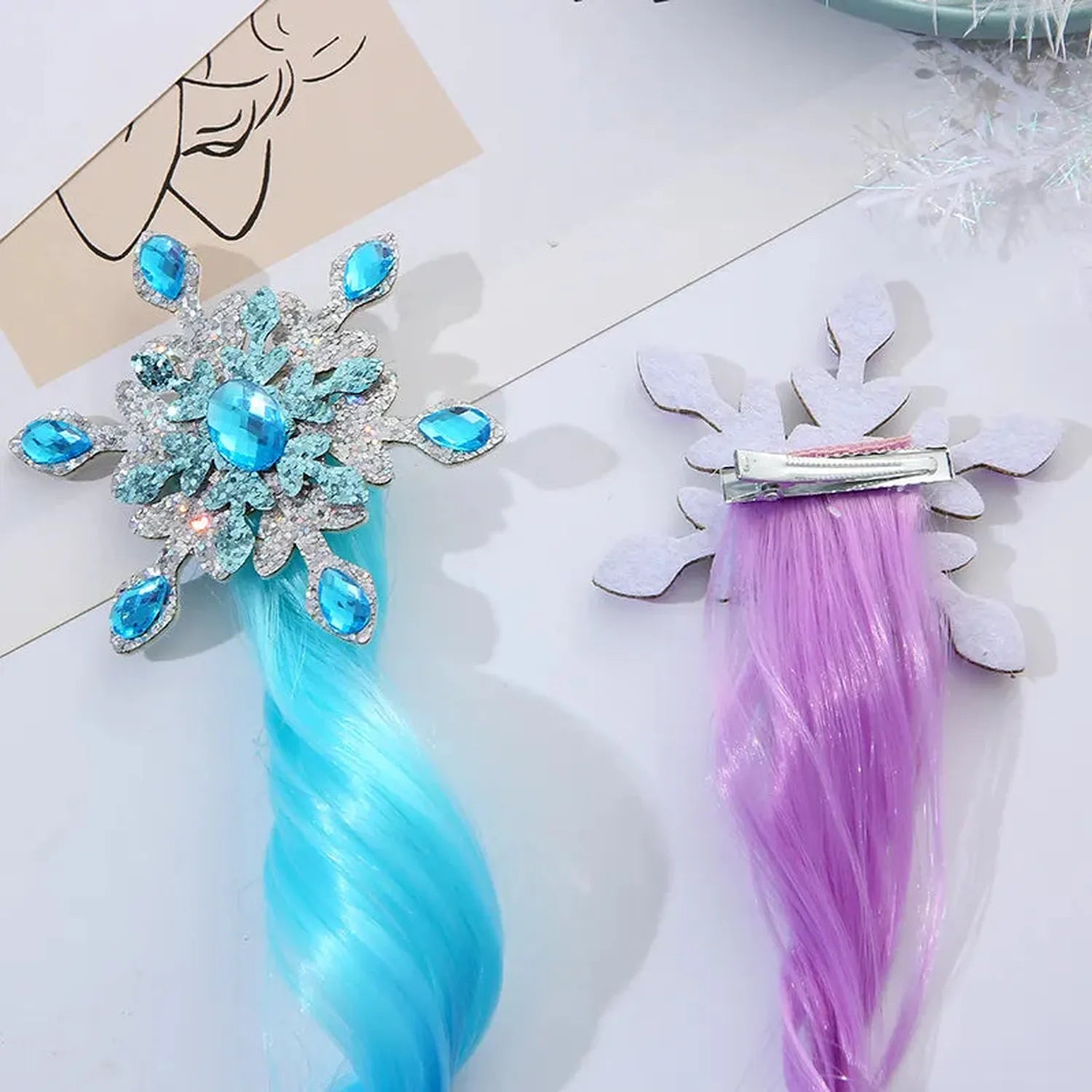 Princess pink clip in hair piece with purple synthetic hair and snowflake design clip by Melchior Jewellery