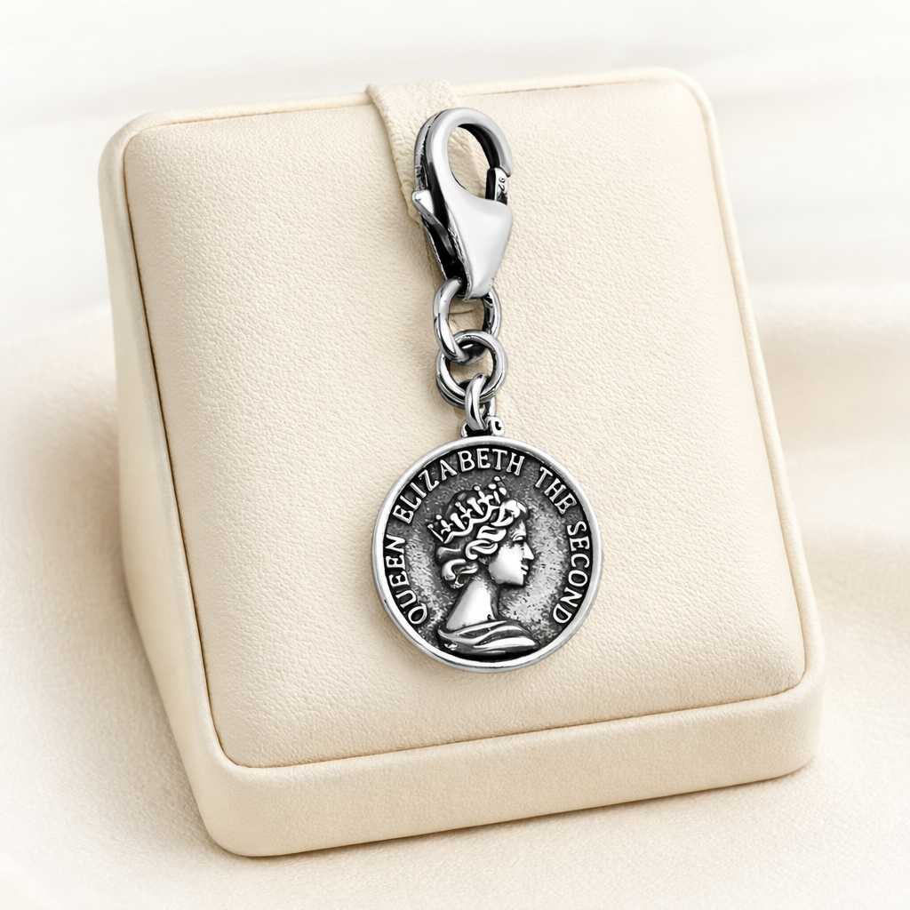 Silver Queen Elizabeth Charm by Melchior Jewellery featuring detailed profile with crown on round pendant and lobster clasp