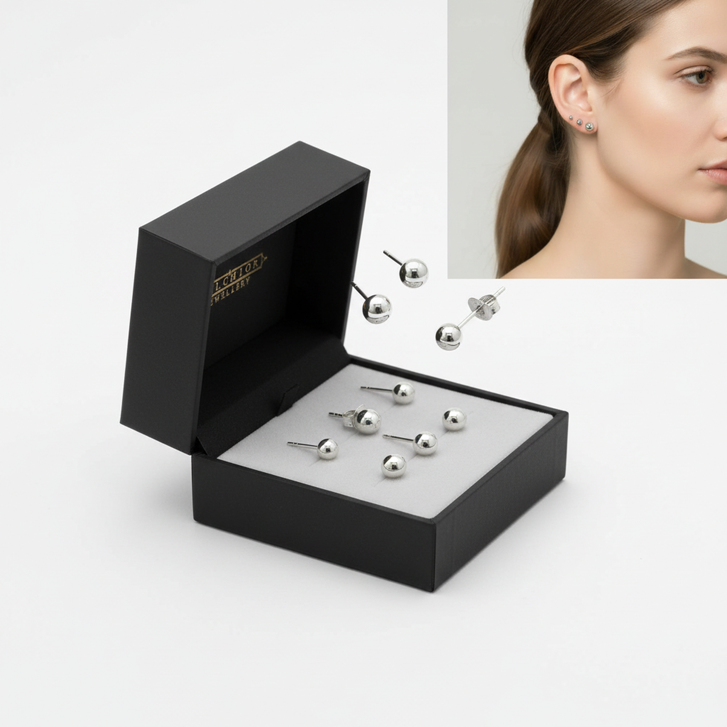 Sterling silver ball stud earrings for children by Melchior Jewellery in a black gift box