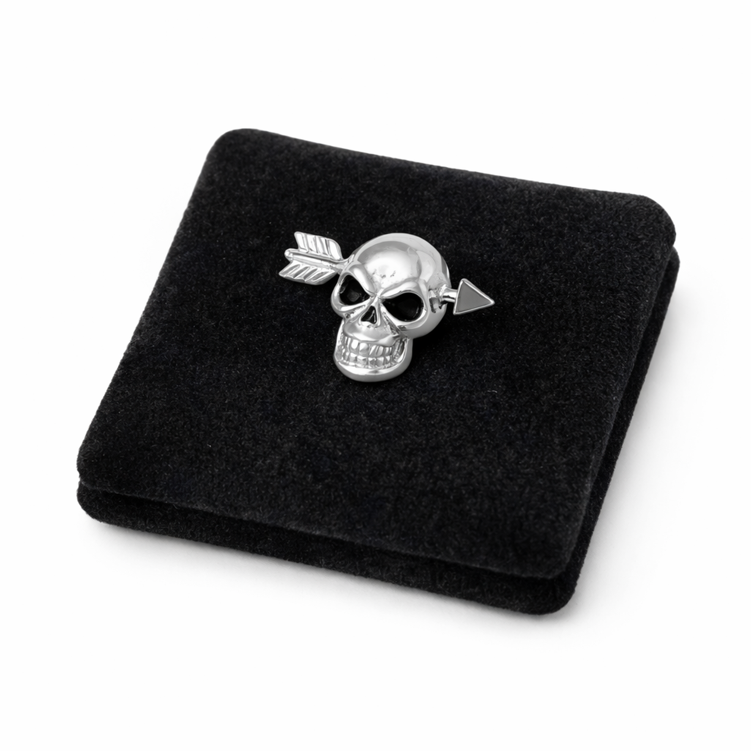 Melchior Jewellery single skull earring for men in silver with arrow detail on black velvet pad