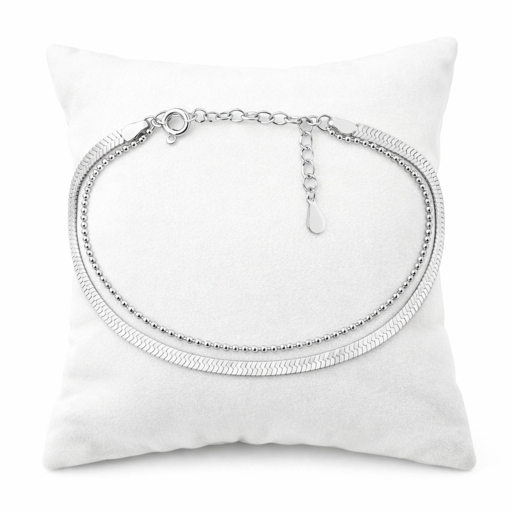 Melchior Jewellery sterling silver double chain bracelet displayed on a white cushion