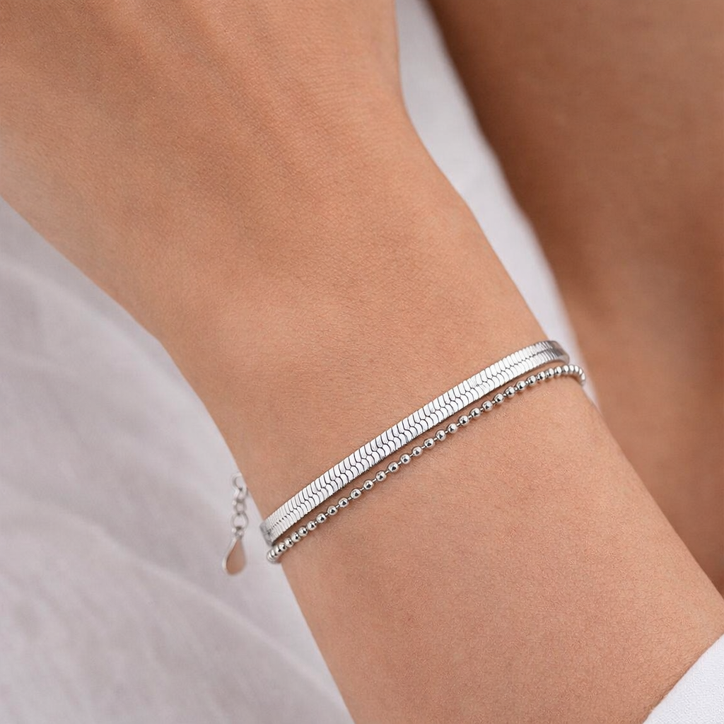 Melchior Jewellery sterling silver double chain bracelet worn on wrist with clasp detail