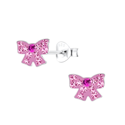 Pink bow shaped sterling silver earrings for children with sparkling crystals by Melchior Jewellery