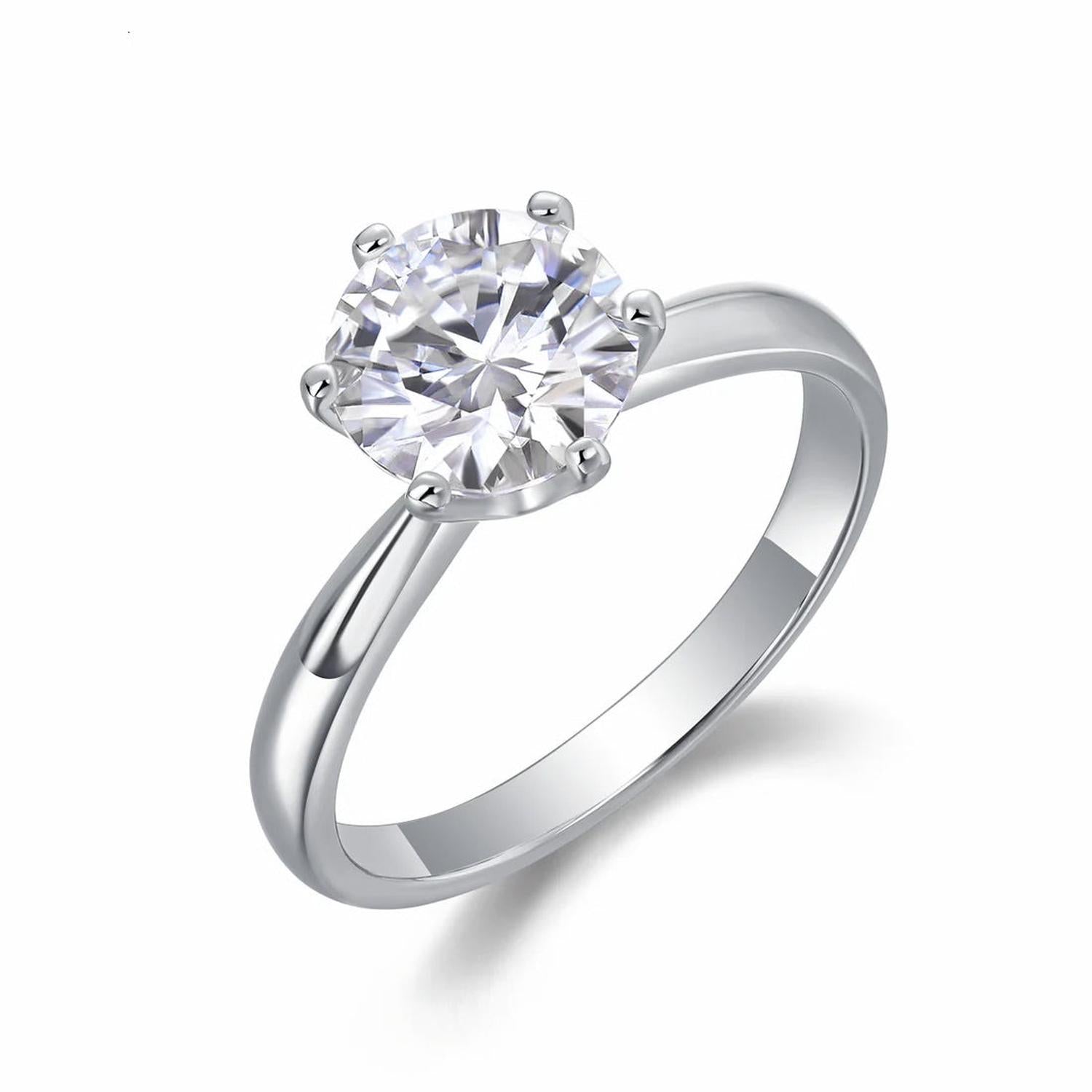 Sterling Silver Round Cut Solitaire Engagement Ring by Melchior Jewellery with a sparkling clear gemstone