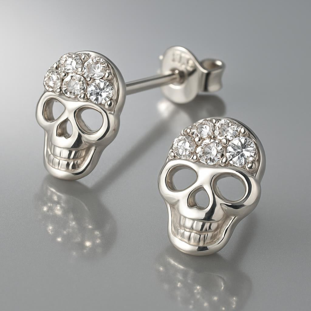 Melchior Jewellery sterling silver skull stud earrings with sparkling crystal detailing