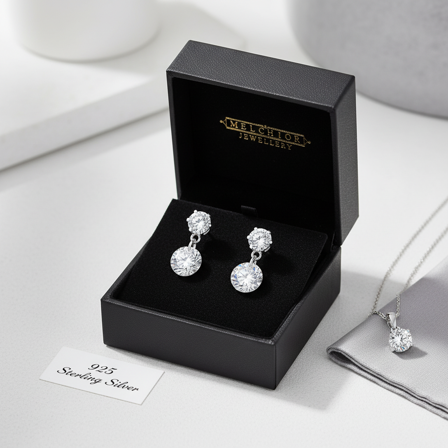 925 sterling silver sparkling CZ earrings for women in black gift box by Melchior Jewellery