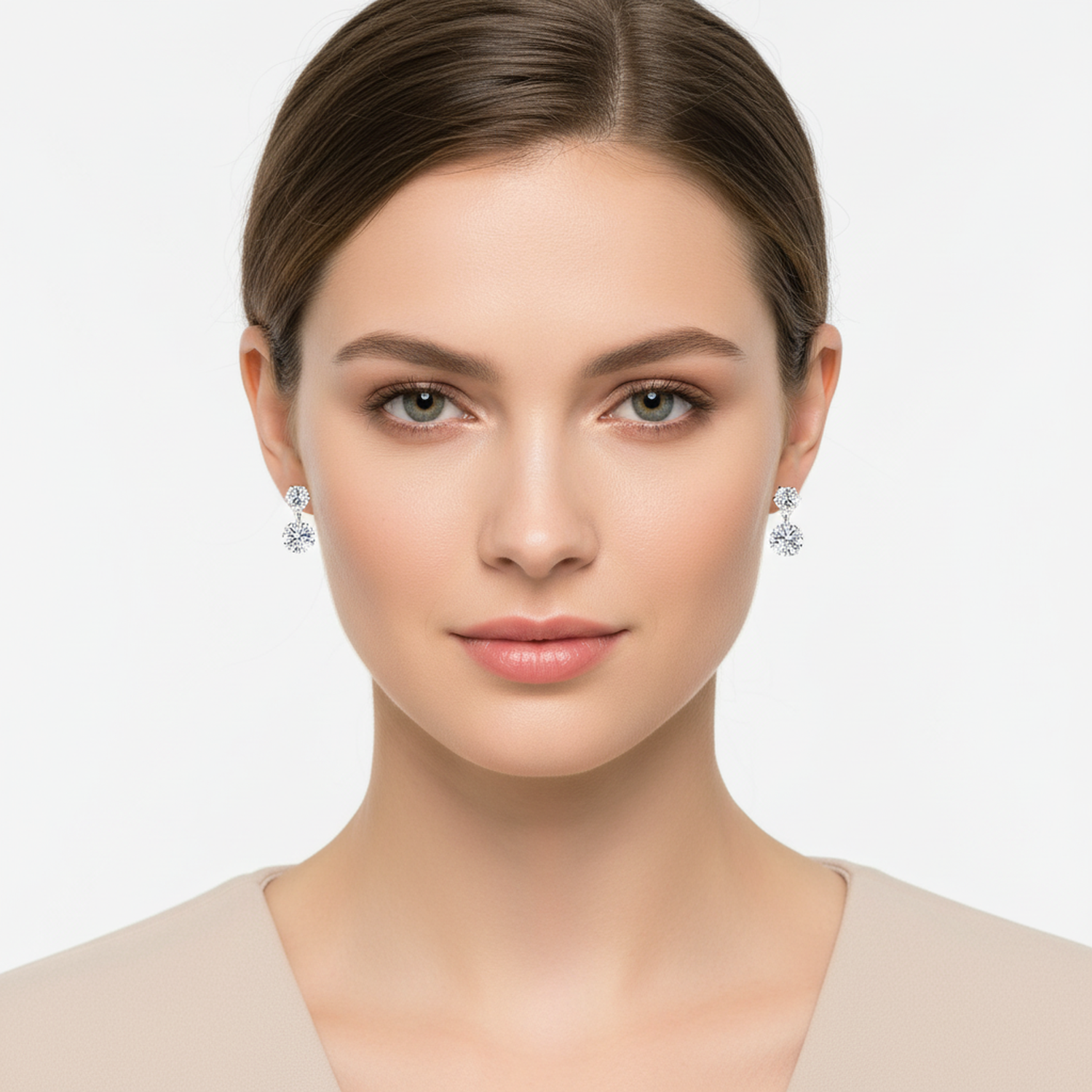 silver sparkling CZ earrings for women worn by model with neutral makeup and beige top