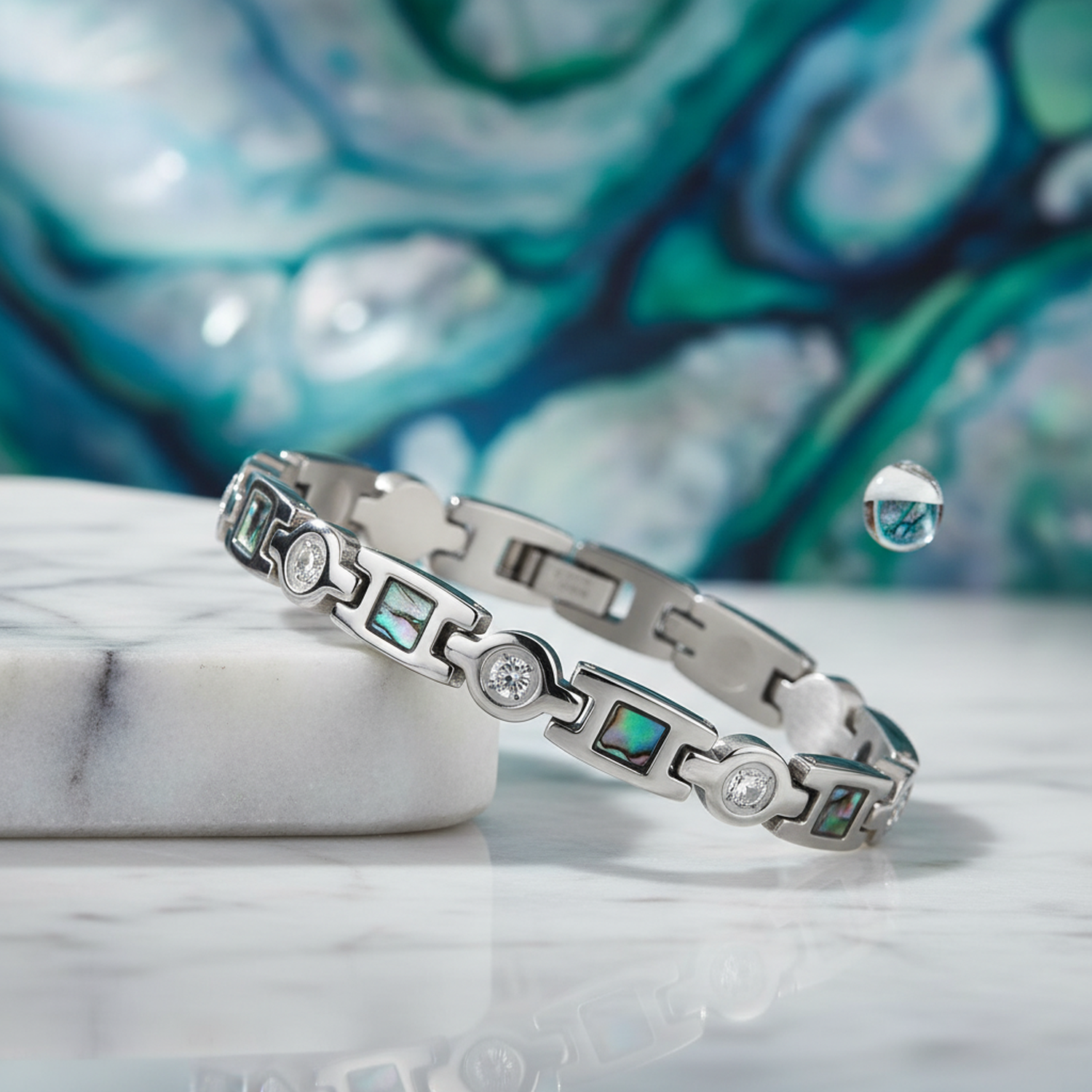 womans silver bracelet magnetic with green and clear cz stones