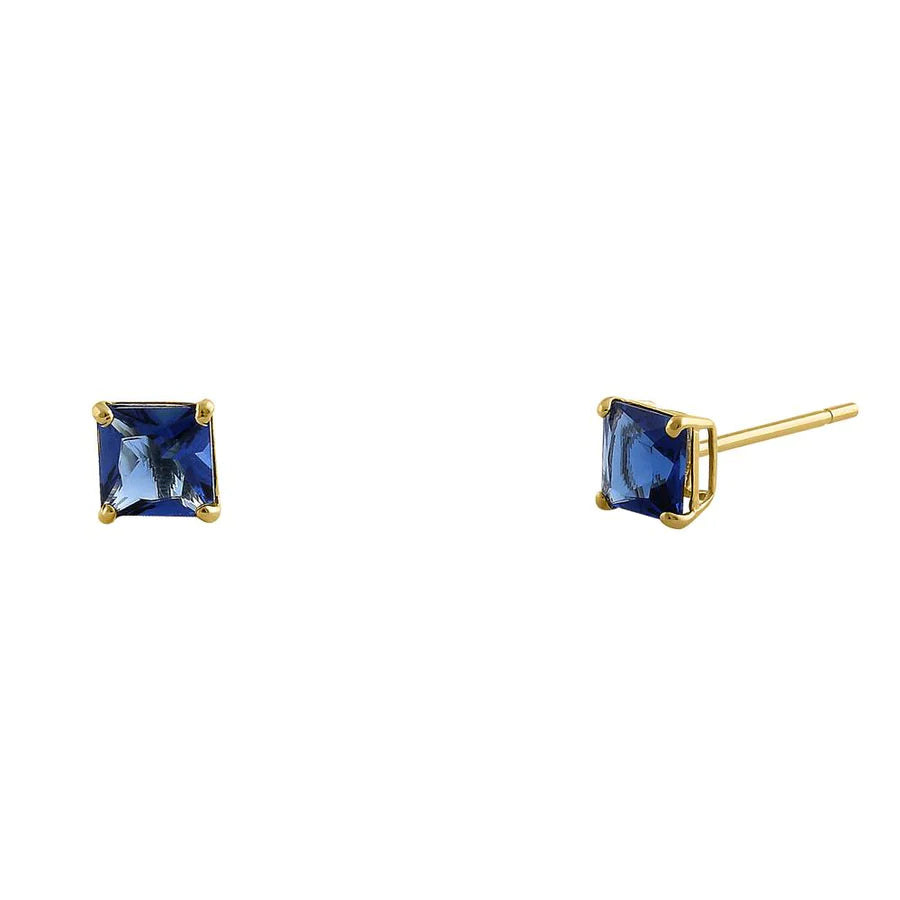 Melchior Jewellery 14k yellow gold blue sapphire earrings with square-cut gemstones and stud design