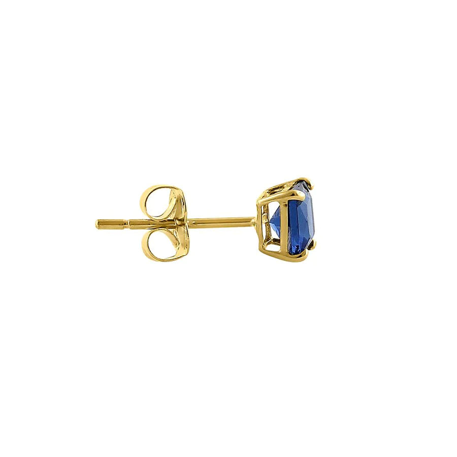 14k yellow gold blue sapphire earrings with a round blue sapphire set in a yellow gold stud setting