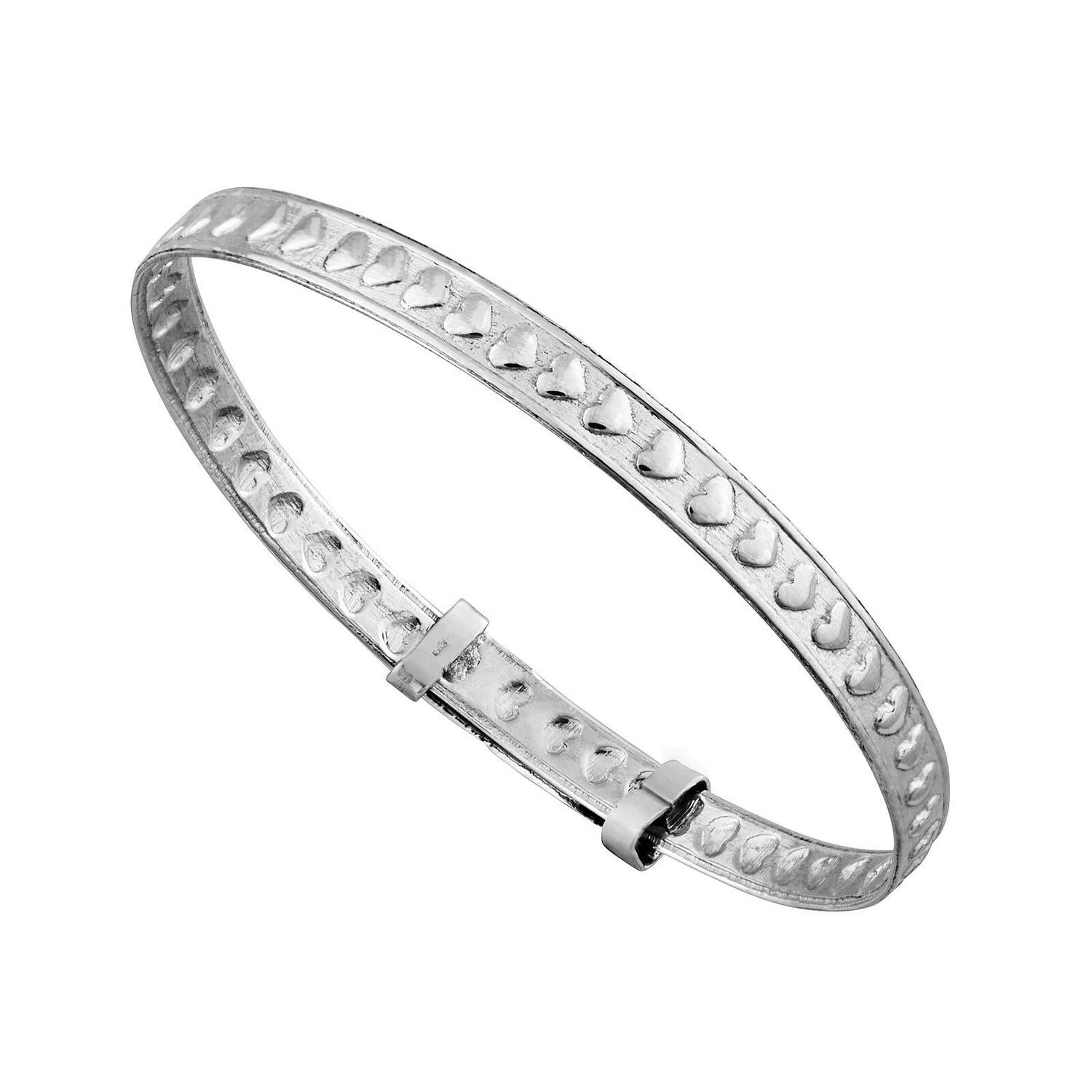 Sterling silver baby christening bangle with heart pattern by Melchior Jewellery