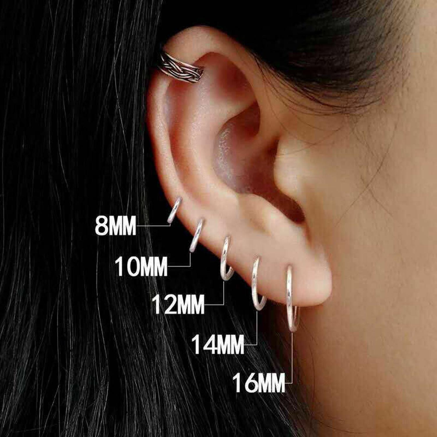 Melchior Jewellery sterling silver hoop earring set for children in various sizes worn on ear