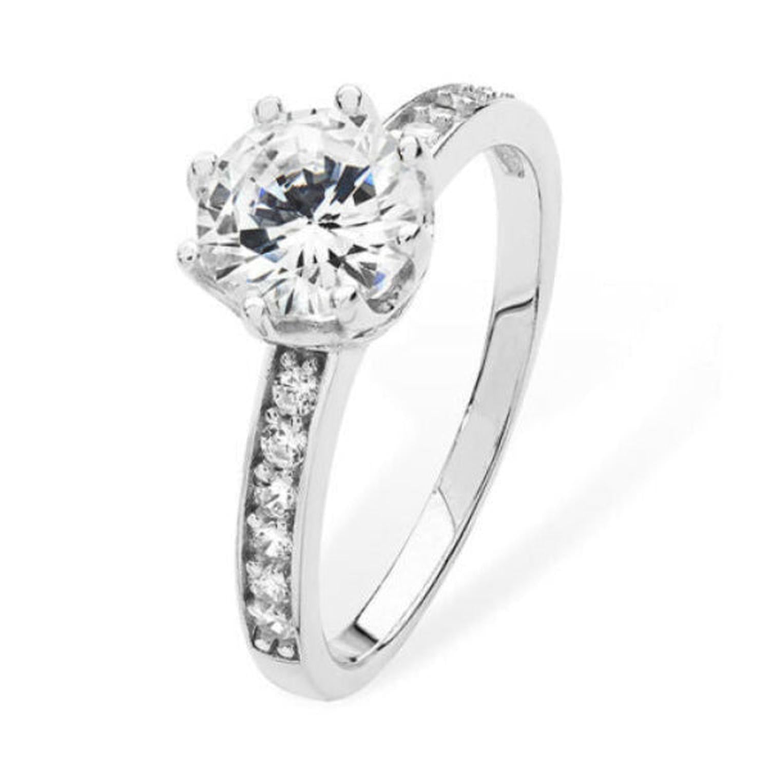 Sterling silver solitaire engagement ring with a large central stone and smaller accent diamonds by Melchior Jewellery