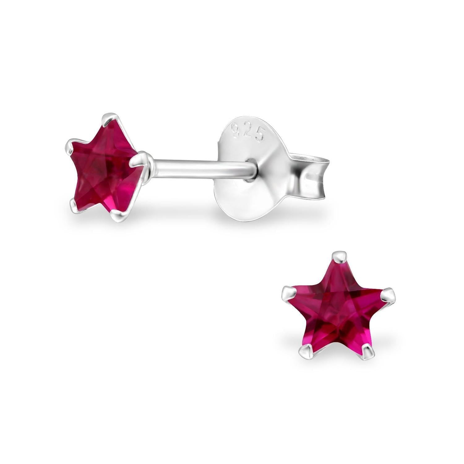 Melchior Jewellery sterling silver star birthstone earrings with deep red star studs in six prong setting