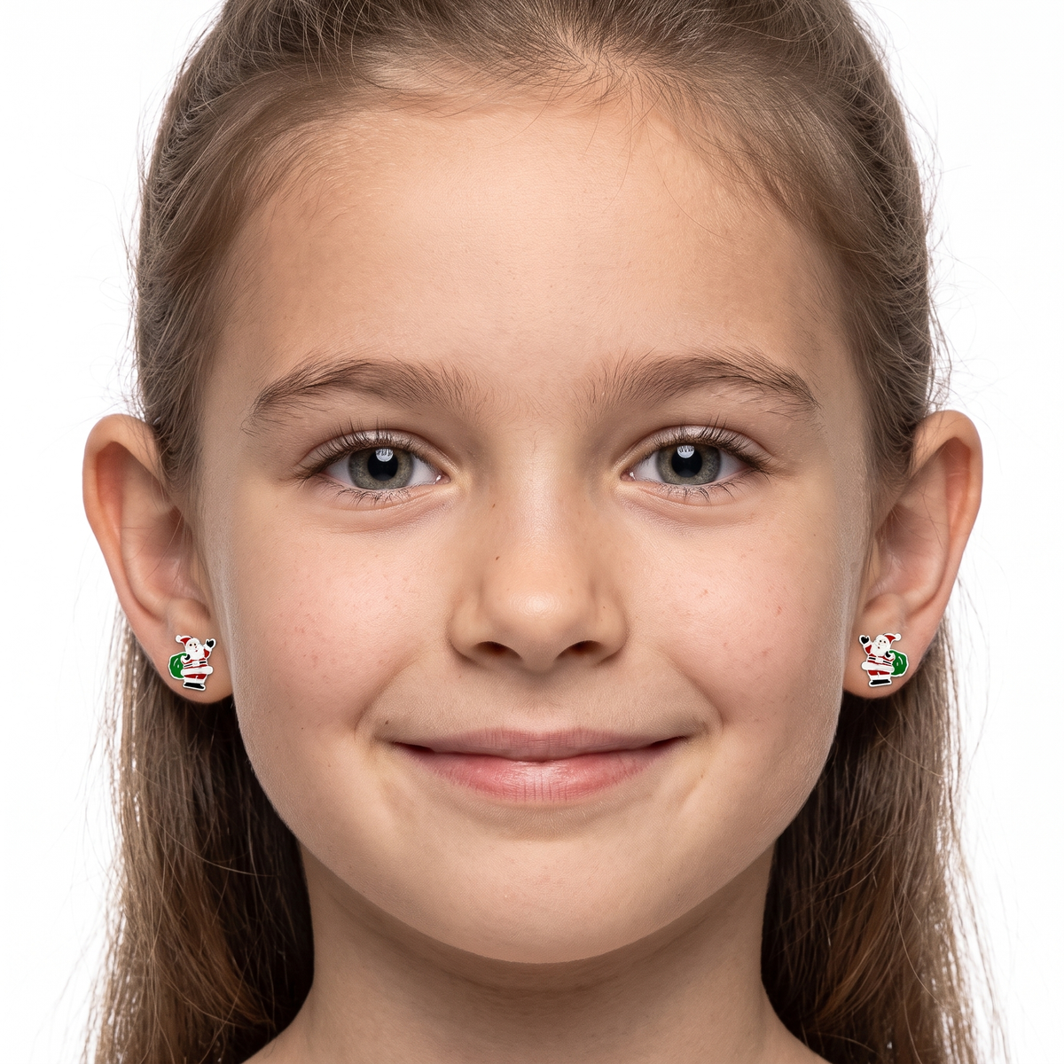 Close-up of Santa design Christmas earrings for children