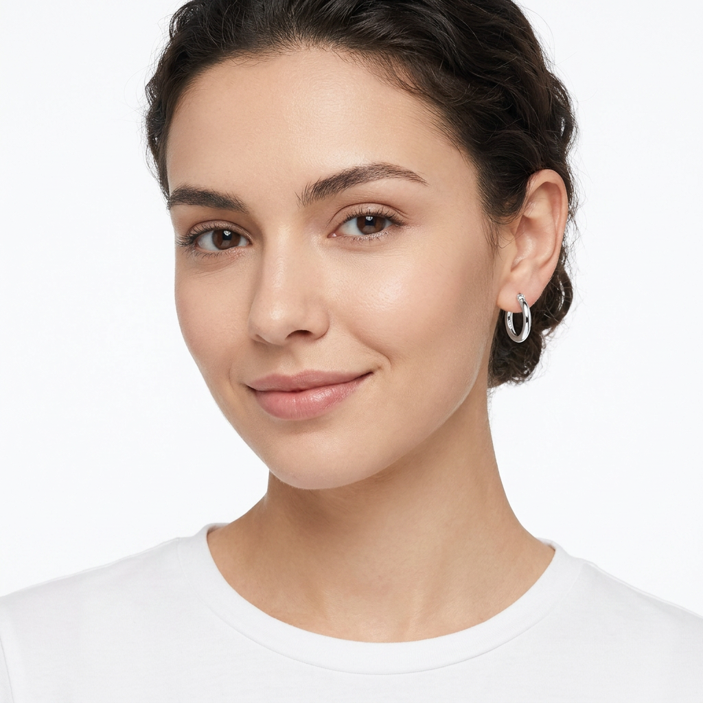 Silver Hoop Earrings complementing a natural makeup look.