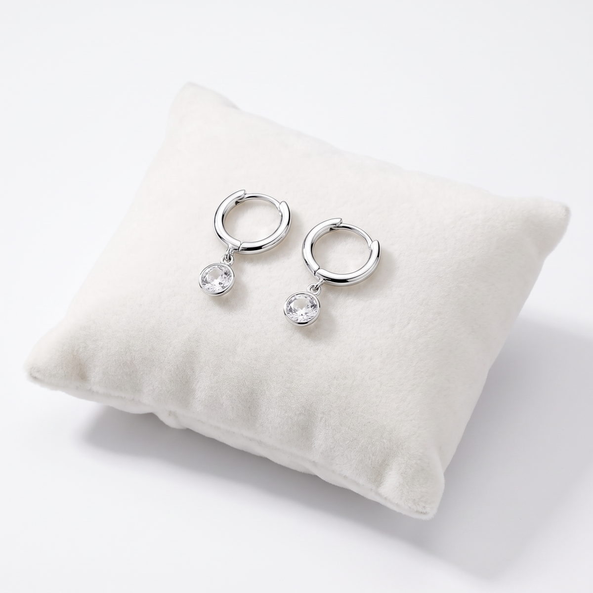 925 Sterling Silver White CZ Lock Hoop Earrings On Jewellery Cushion