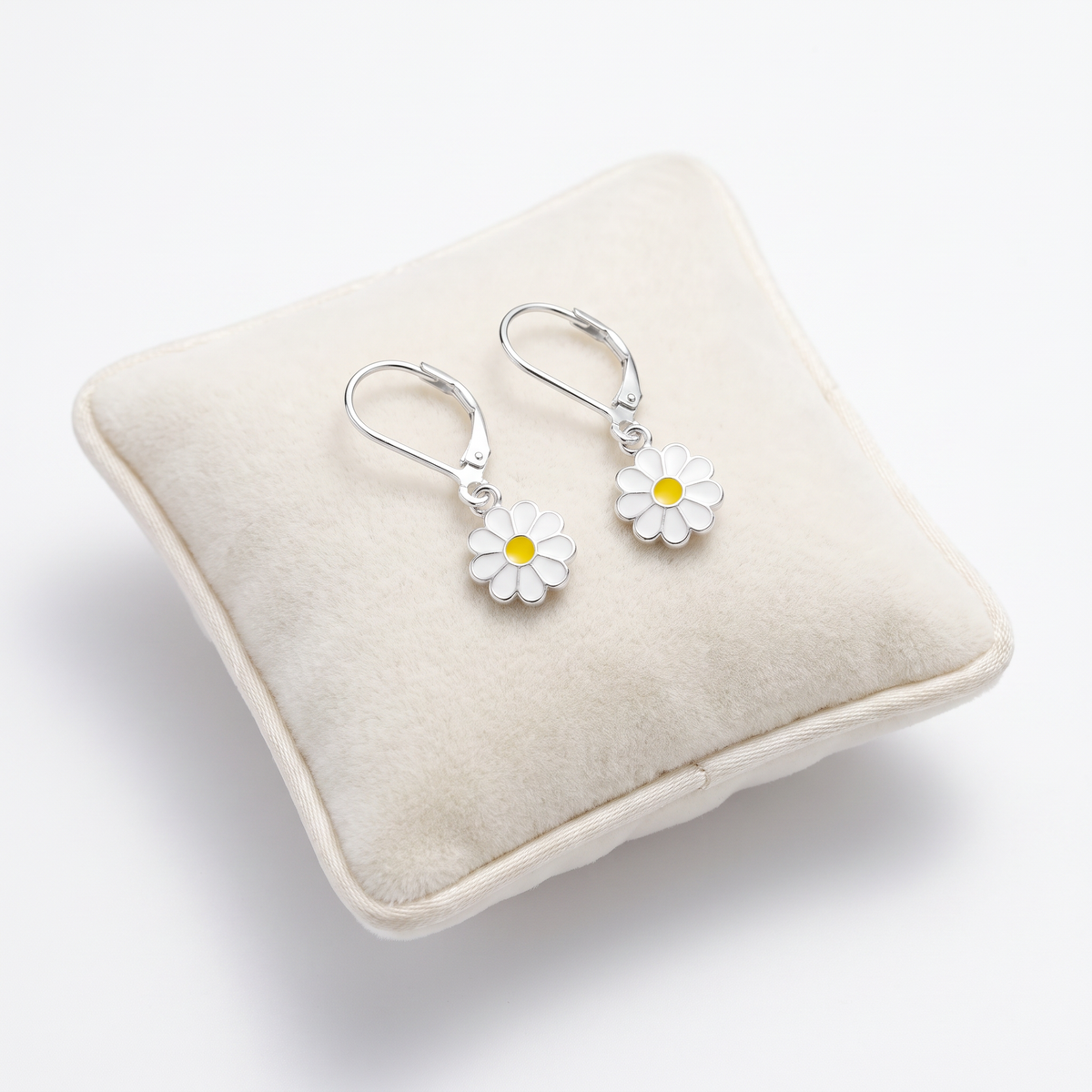 Girls 925 Sterling Silver Daisy Leverback Earrings on jewellery cushion