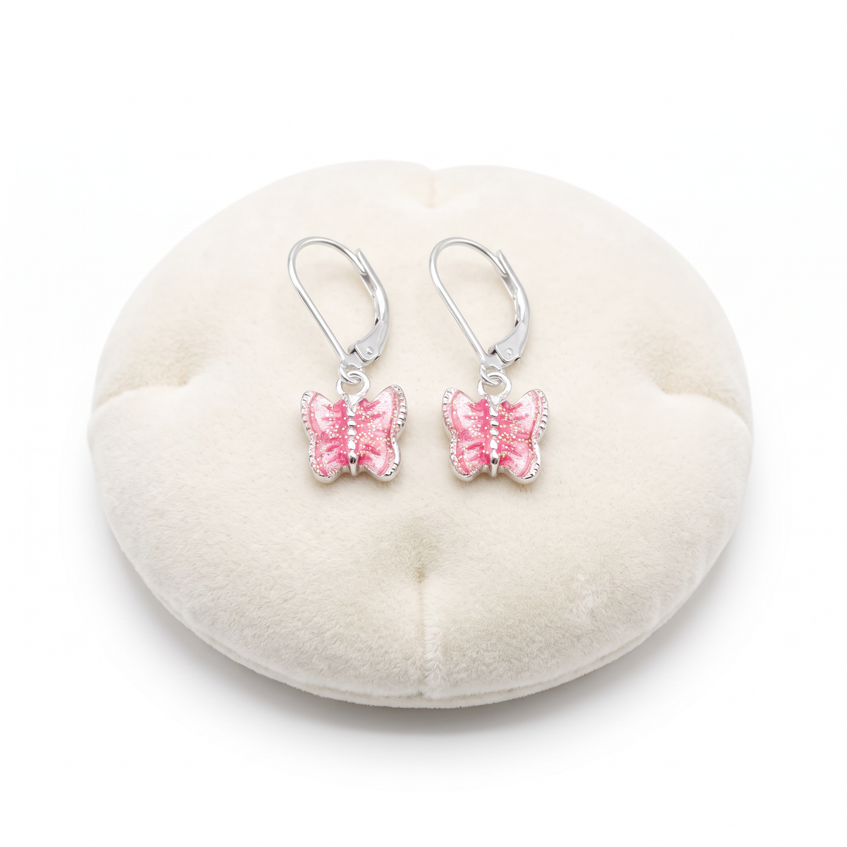 Girls sterling silver sparkly butterfly leverback earrings on cushion