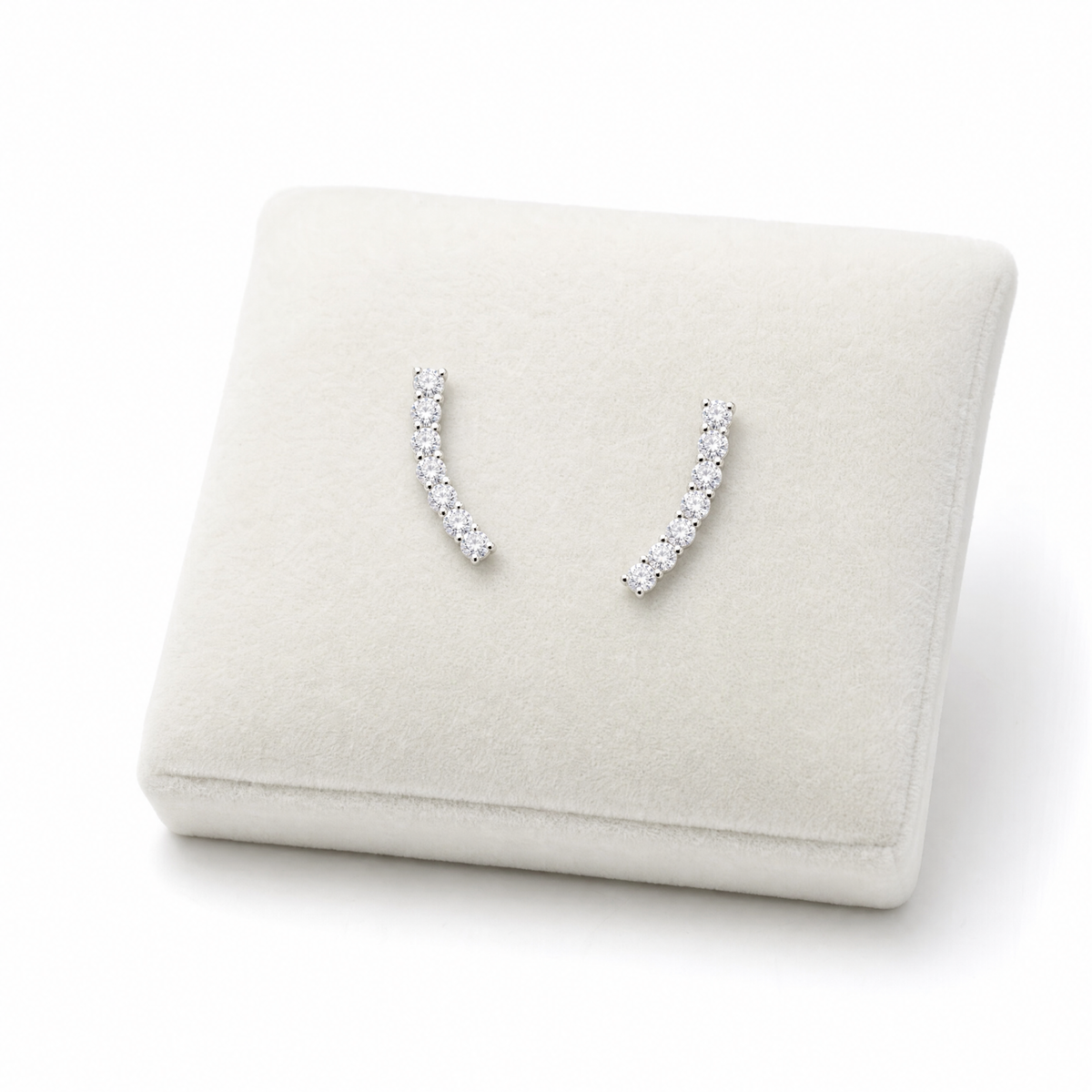 Sterling silver curved CZ stud earrings close up