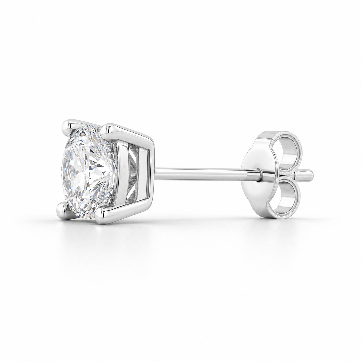 A single cz mens stud earring in a silver-toned setting, shown from a side profile view against a clean white background.