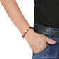 Person wearing a Love Heart Design Copper Magnetic Bangle, showcasing its delicate heart motifs and stylish appeal.