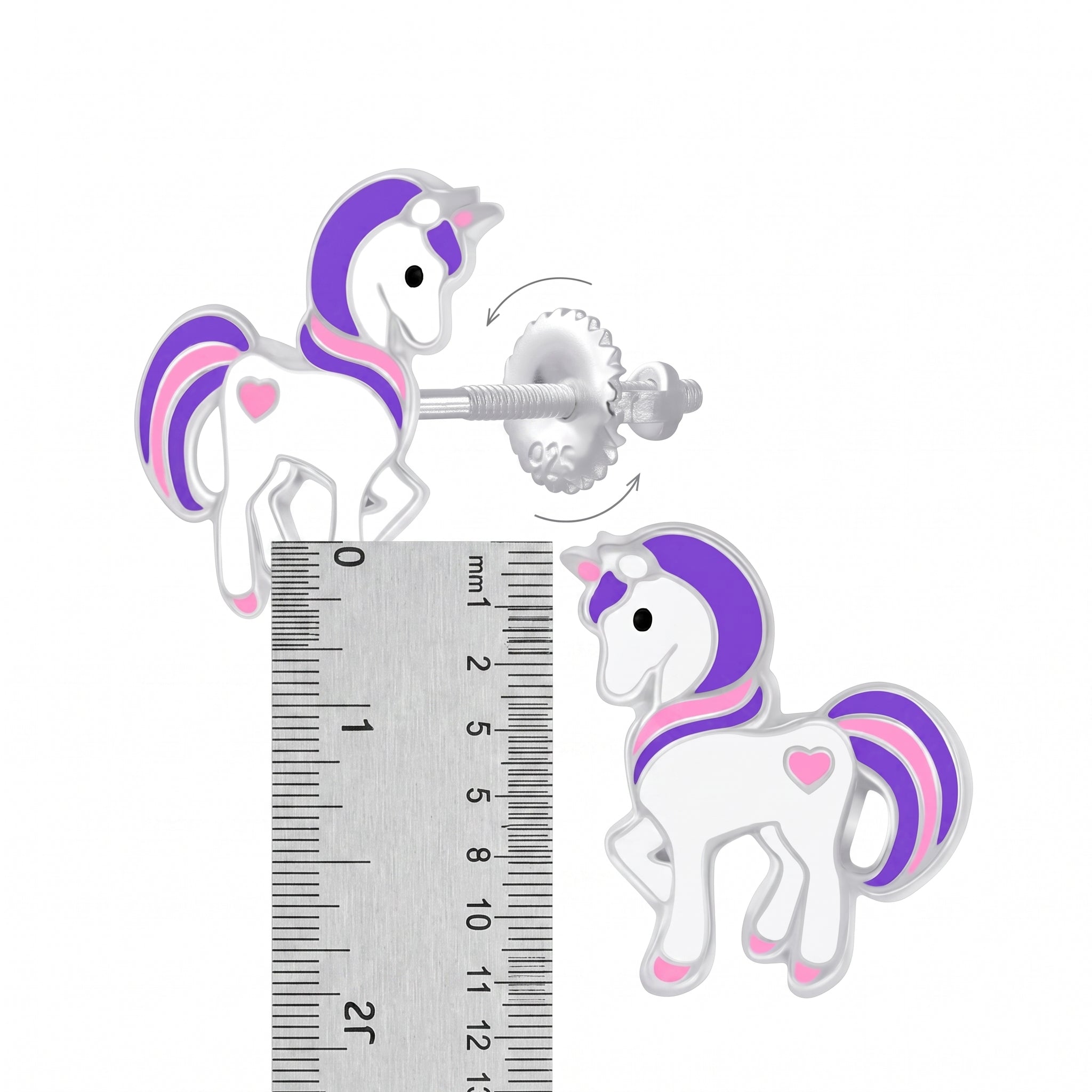 A pair of unicorn stud earrings shown on a white background, with one earring displayed front-facing and the other showing the back post. A metal ruler is placed vertically between them to indicate size.