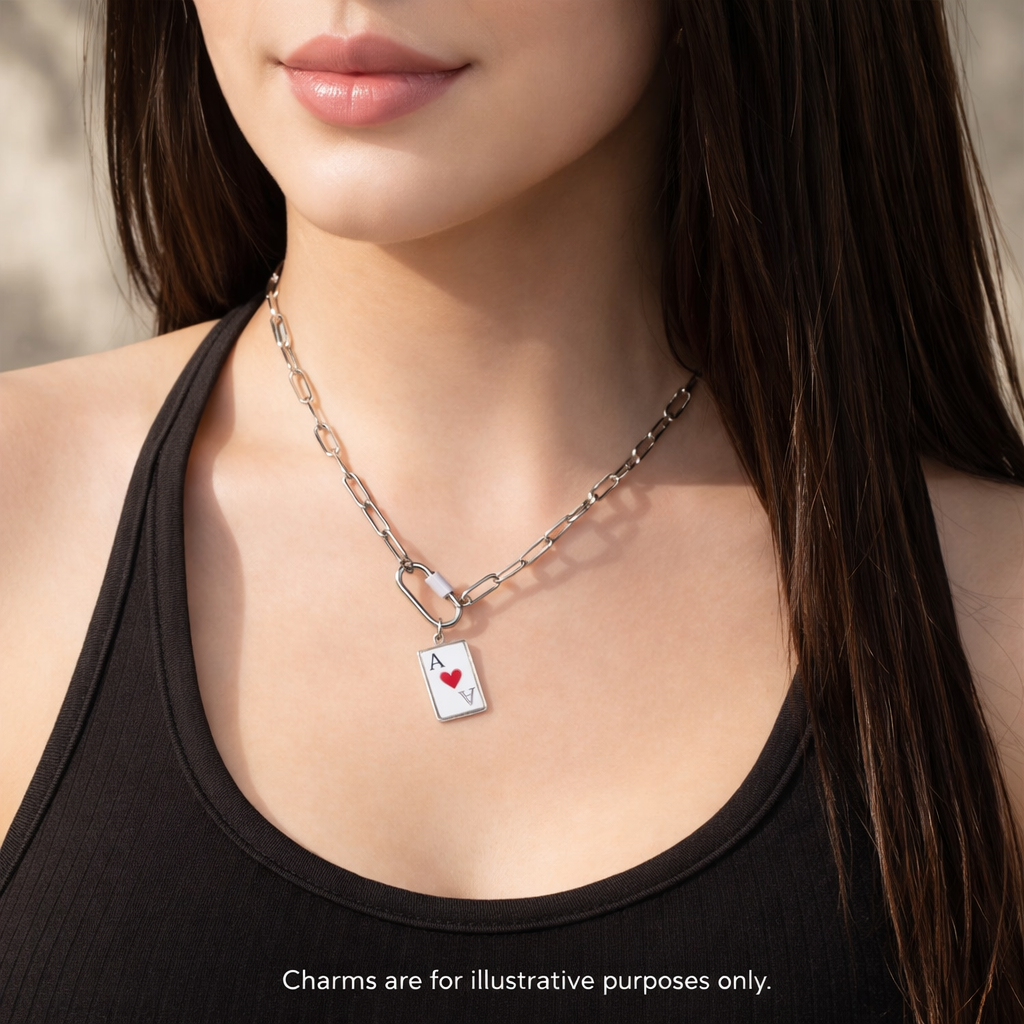Silver stainless steel carabiner necklace by Melchior Jewellery with chain link design and ace of hearts charm worn by woman