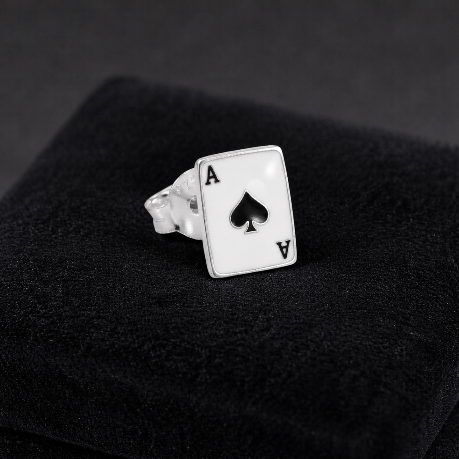 Mens single stud playing card earring by Melchior Jewellery featuring Ace of Spades design in silver