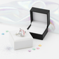 Melchior Jewellery adjustable unicorn ring for kids with pink mane displayed on white and black ring boxes