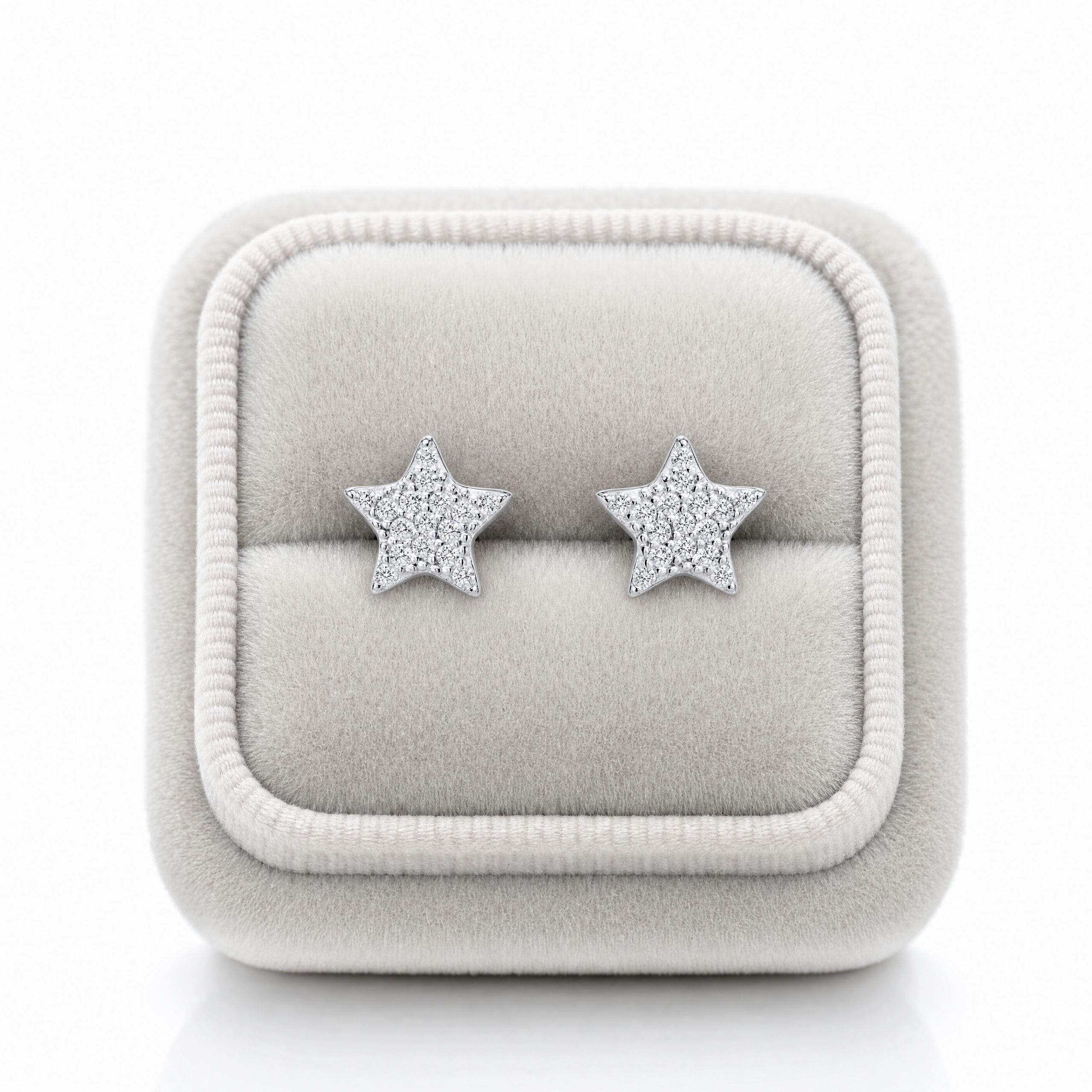 Close-up of sterling silver CZ pave star earrings