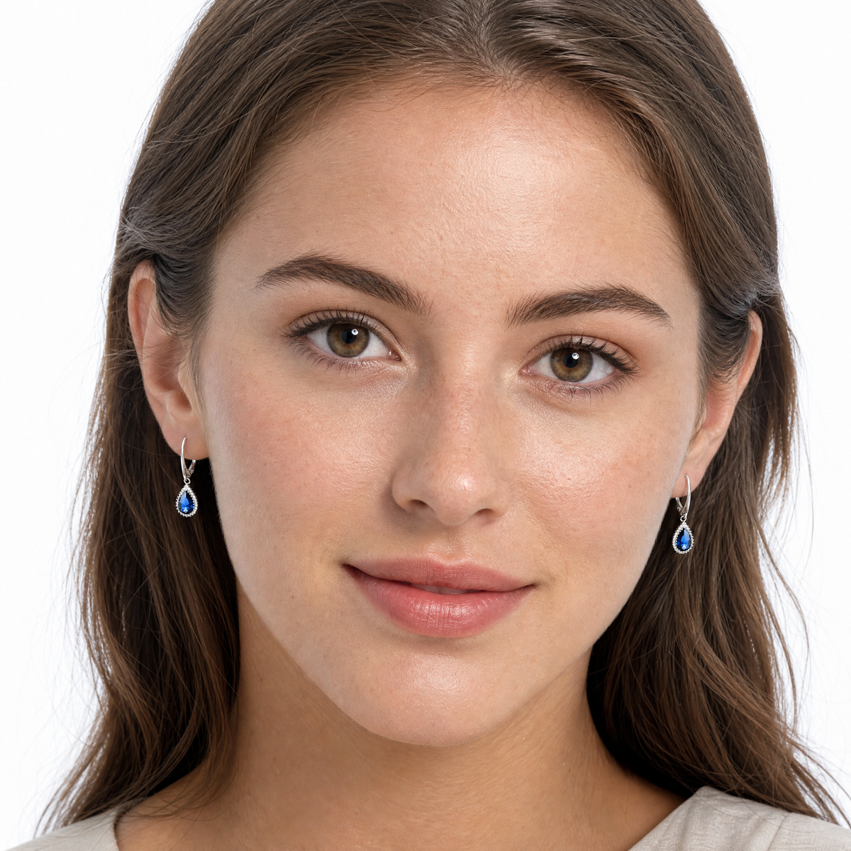 blue sapphire teardrop earrings with sterling silver setting