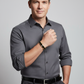 Melchior Jewellery black gold magnetic bracelet worn by man in grey shirt and black belt