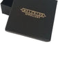 Melchior Jewellery black box packaging for black leather football bracelet with gold logo