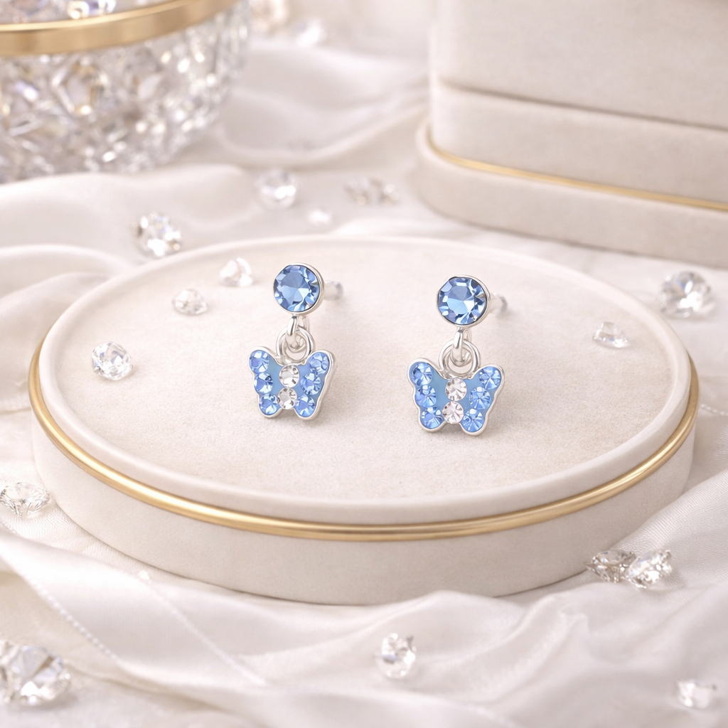 Melchior Jewellery blue butterfly earrings with sparkling light blue crystals on silver studs