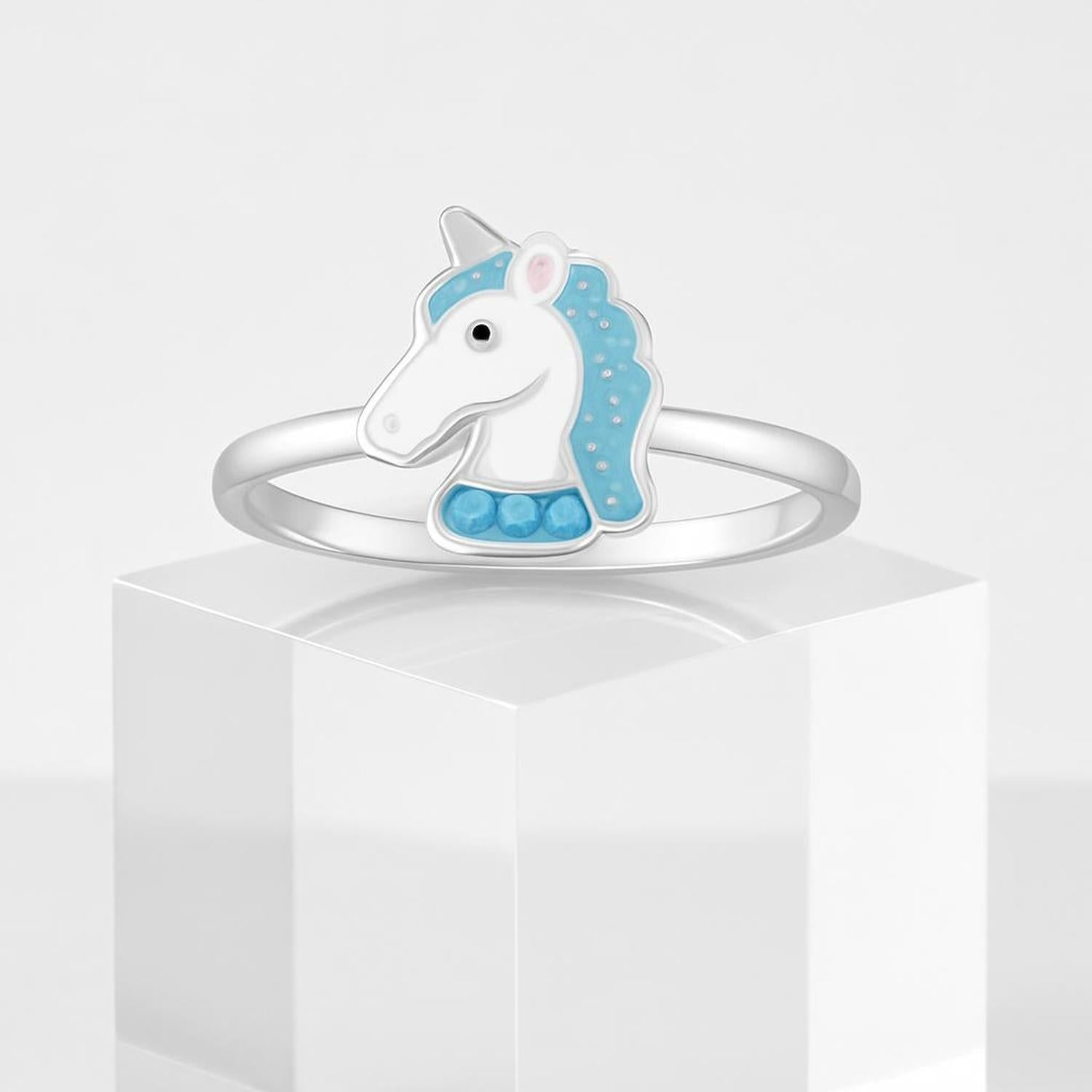 Blue unicorn silver ring for girls by Melchior Jewellery featuring a cute unicorn design with blue accents