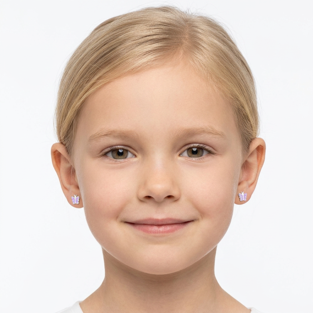 A young girl with blonde hair wearing a purple  butterfly shaped stud earrings, shown in a clean studio portrait against a light gray background.