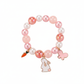 Melchior Jewellery children's pink rabbit bead bracelet with pink and white beads and rabbit charm