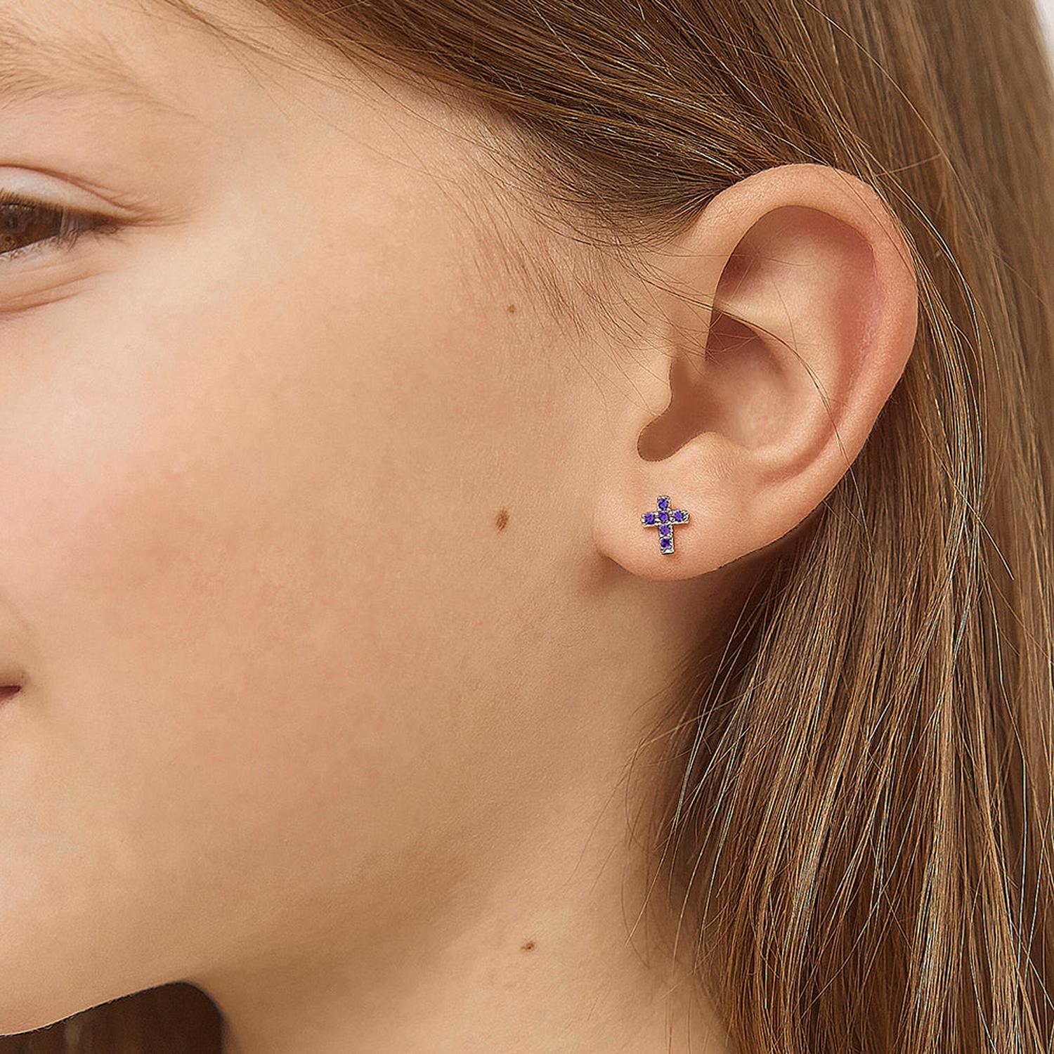 children silver cross earrings with blue stones worn by child from In Season Jewellery