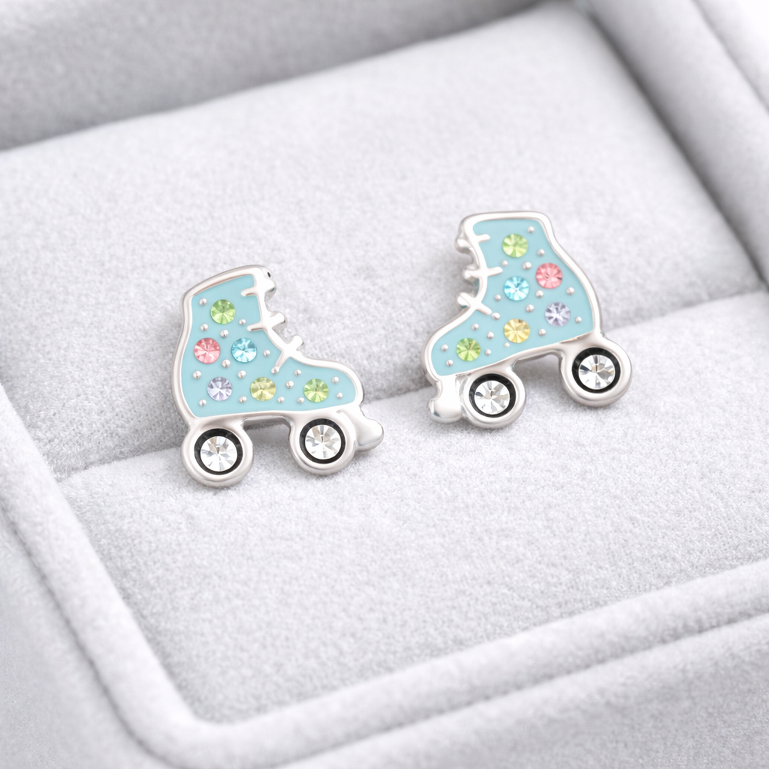 Sterling silver girls roller skate earrings with colourful gemstone details by Melchior Jewellery