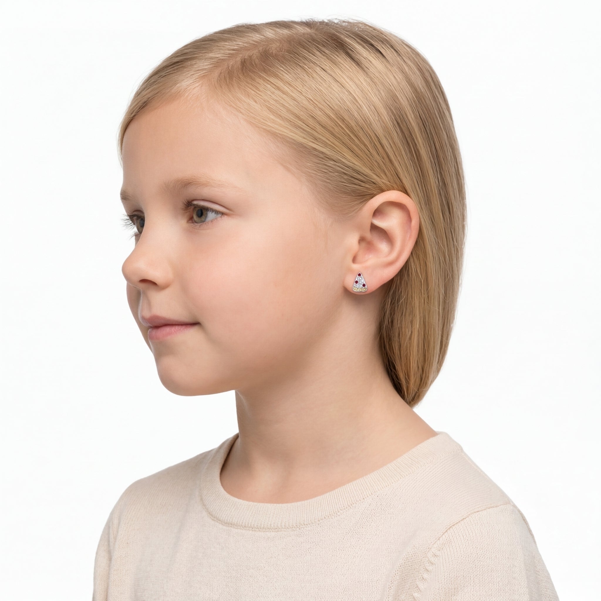 Young girl wearing Melchior Jewellery childrens pizza earrings featuring yellow cheese base with red and black toppings