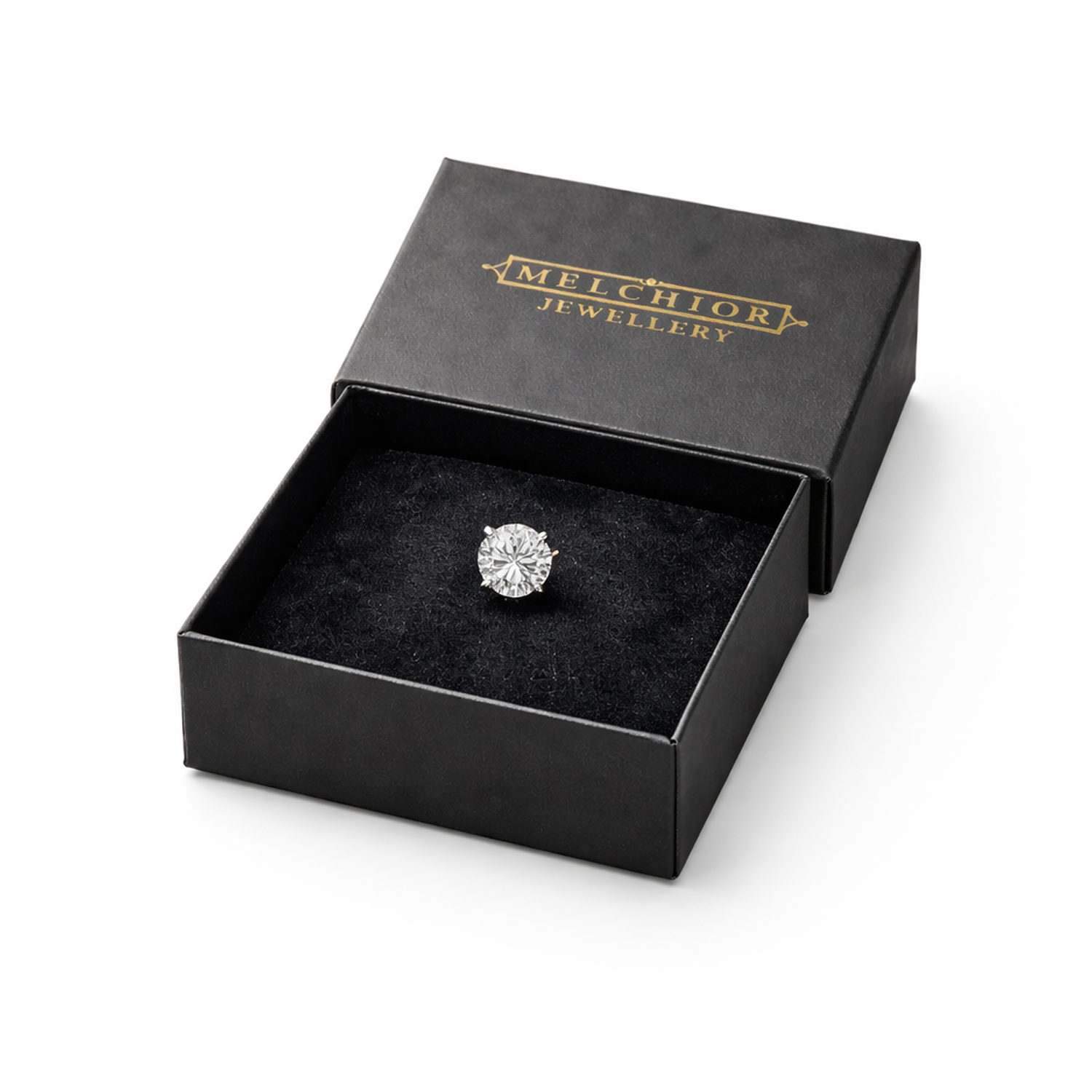Single 6mm cubic zirconia earring for men set in silver displayed in a black Melchior Jewellery box