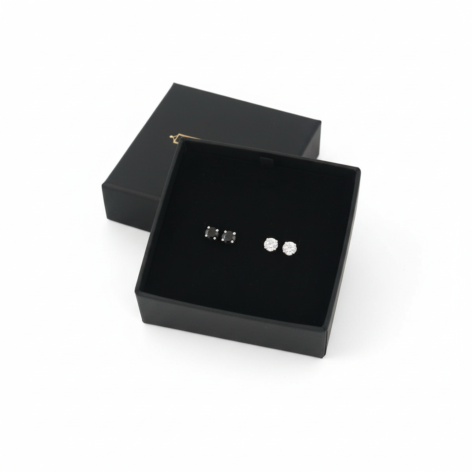 Melchior Jewellery tiny black and clear cubic zirconia earrings in black gift box