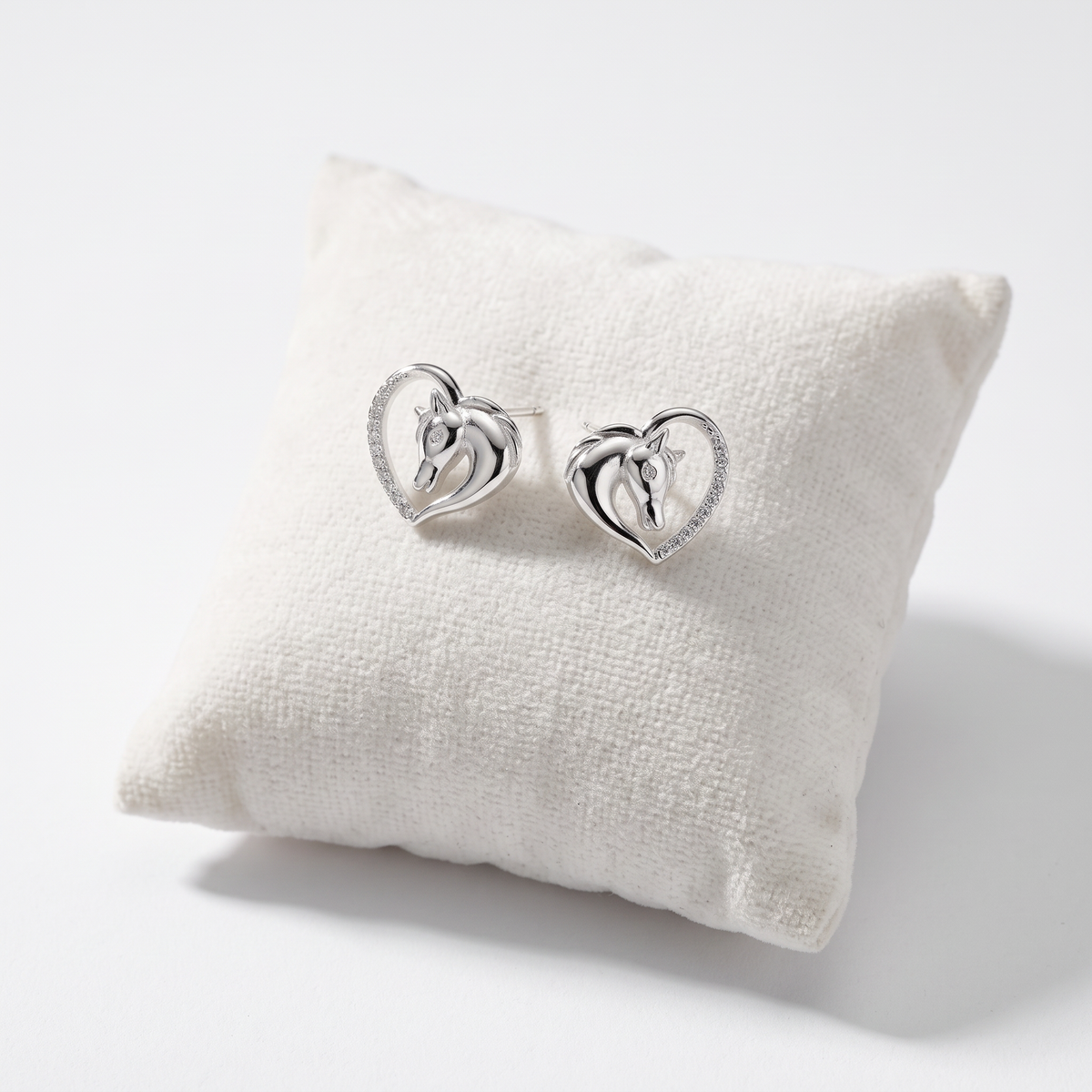 925 Sterling Silver CZ Horse Earrings with Heart on Jewellery Cushion